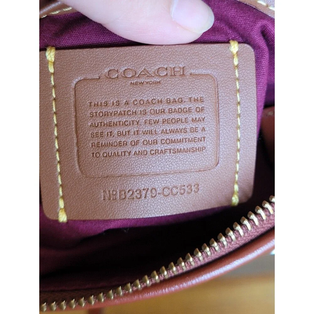 COACH Kitt Colorblock Signature Canvas Leather Messenger Crossbody Bag Tan Brass